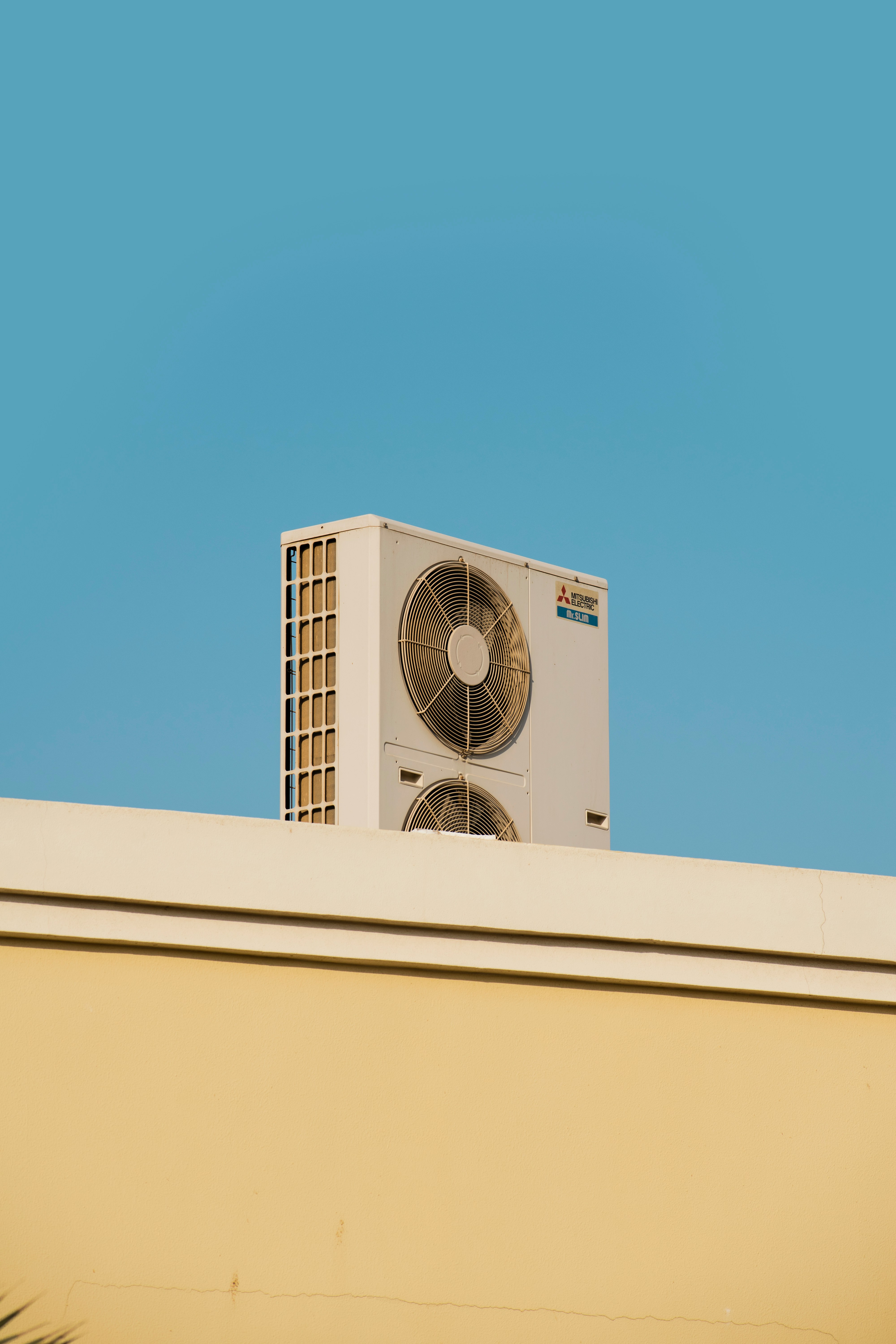 HVAC technician working on a unit