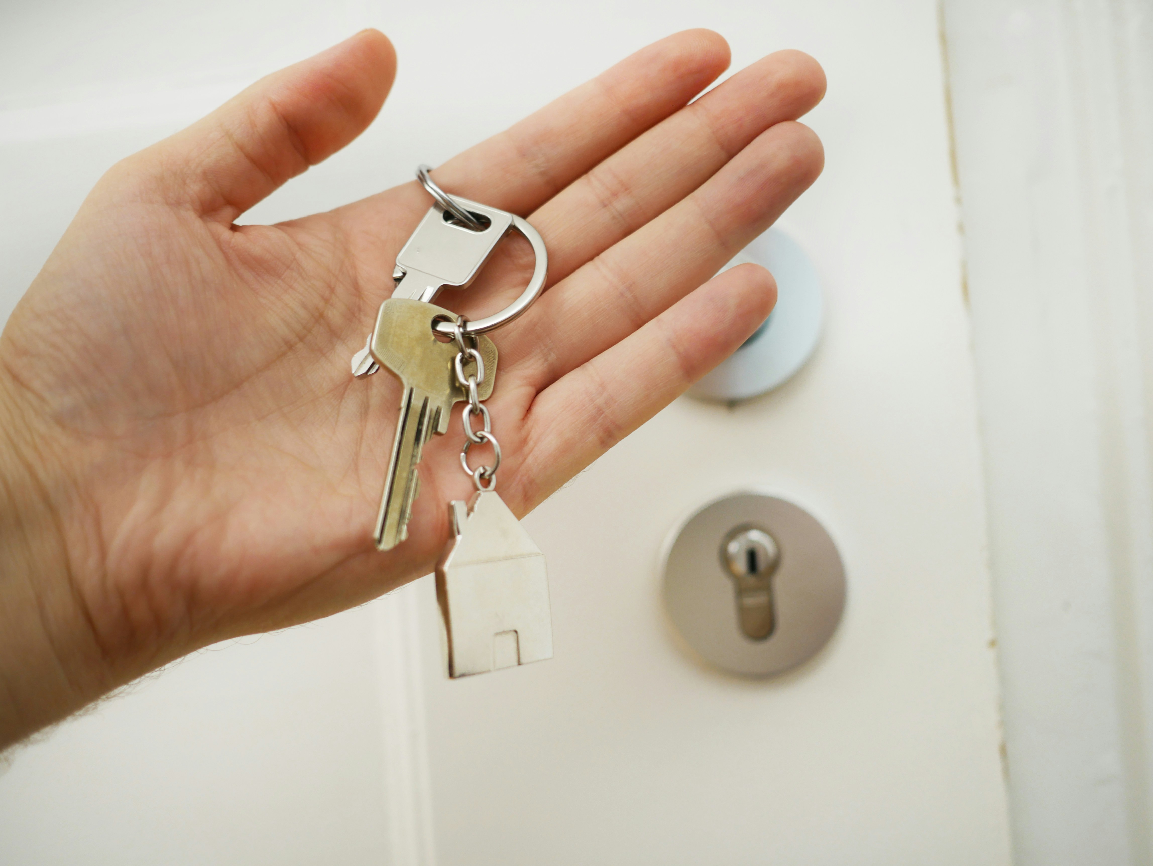 Locksmith working on a door lock