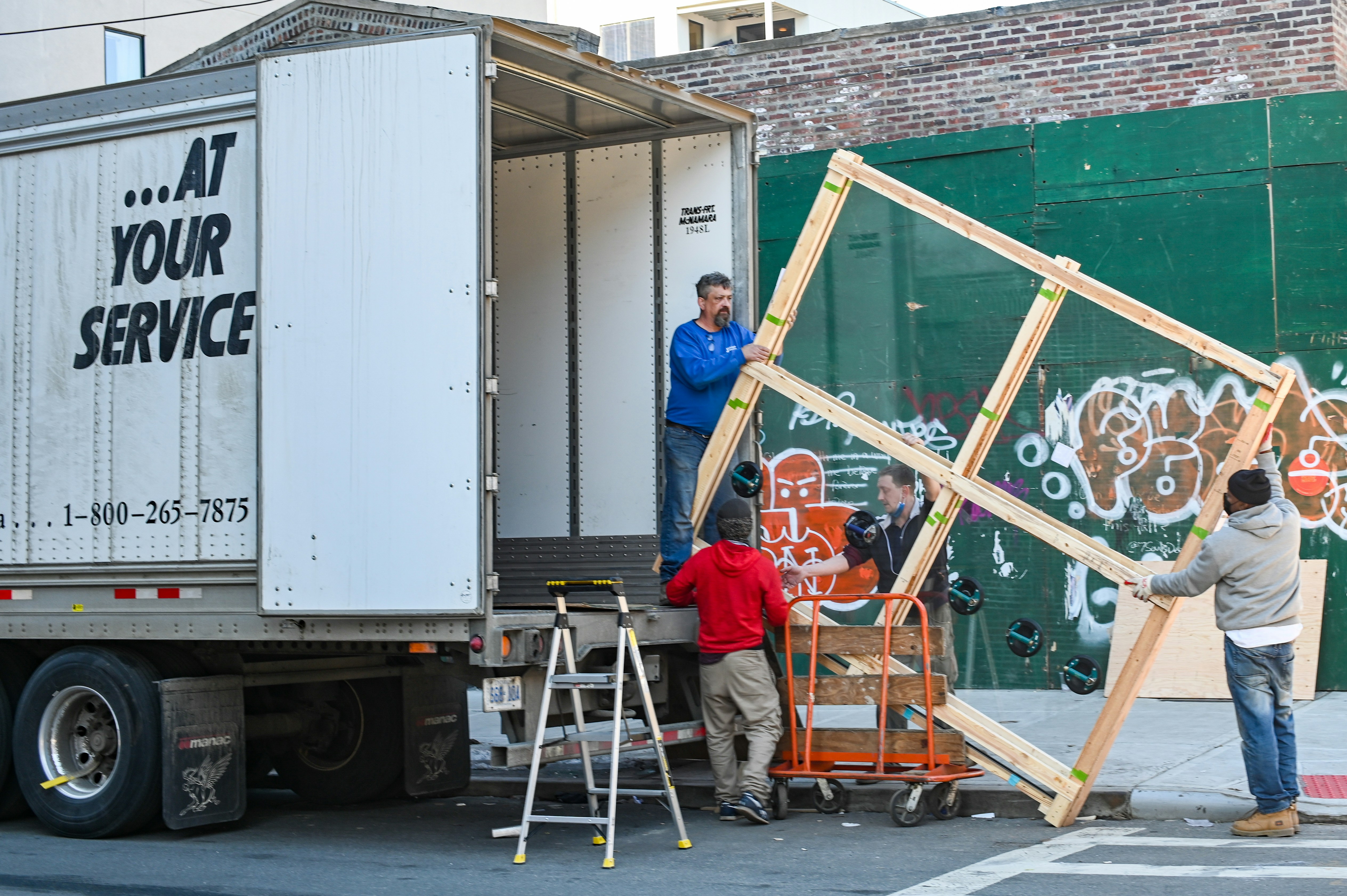 Moving crew loading a truck