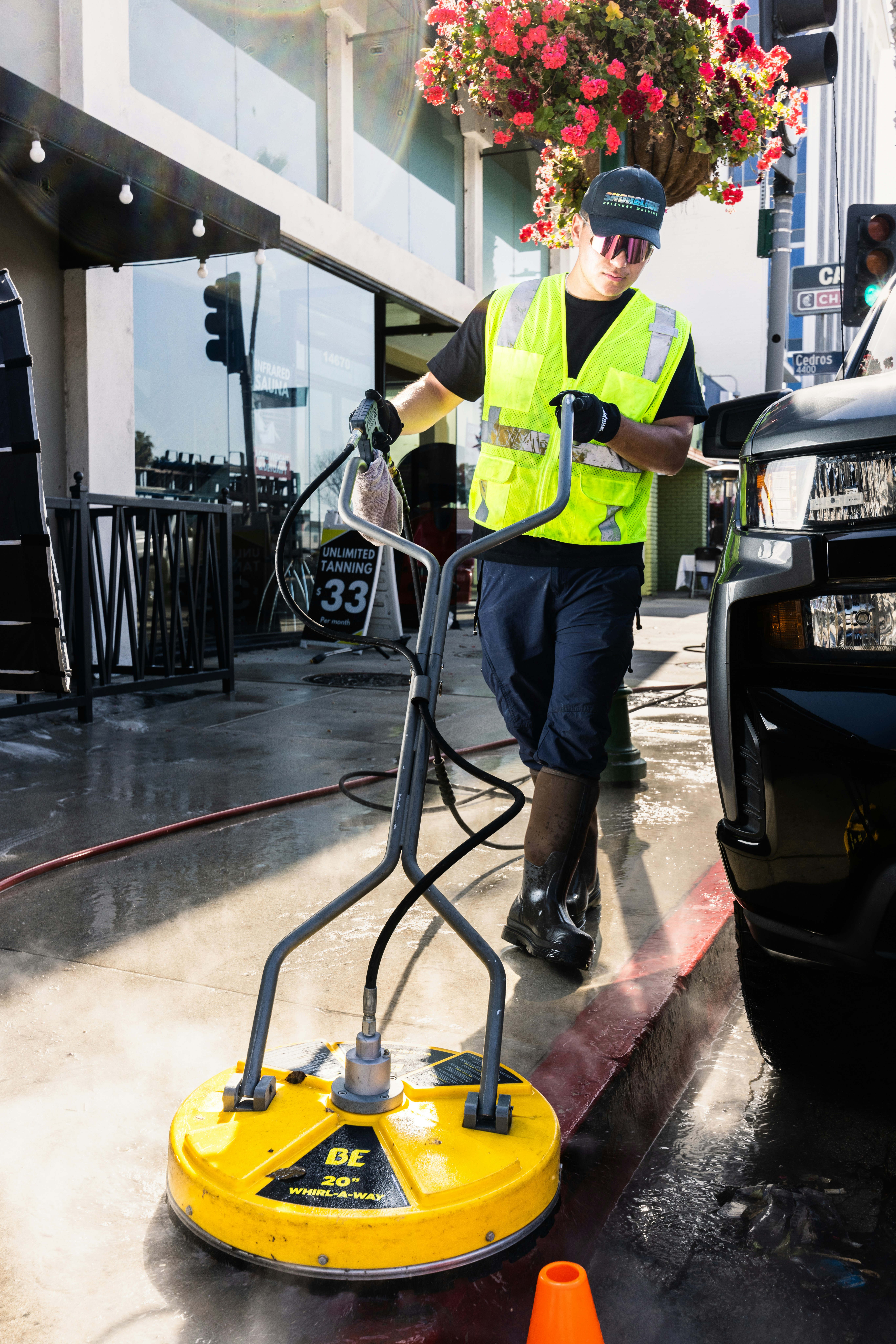 Pressure washing a driveway