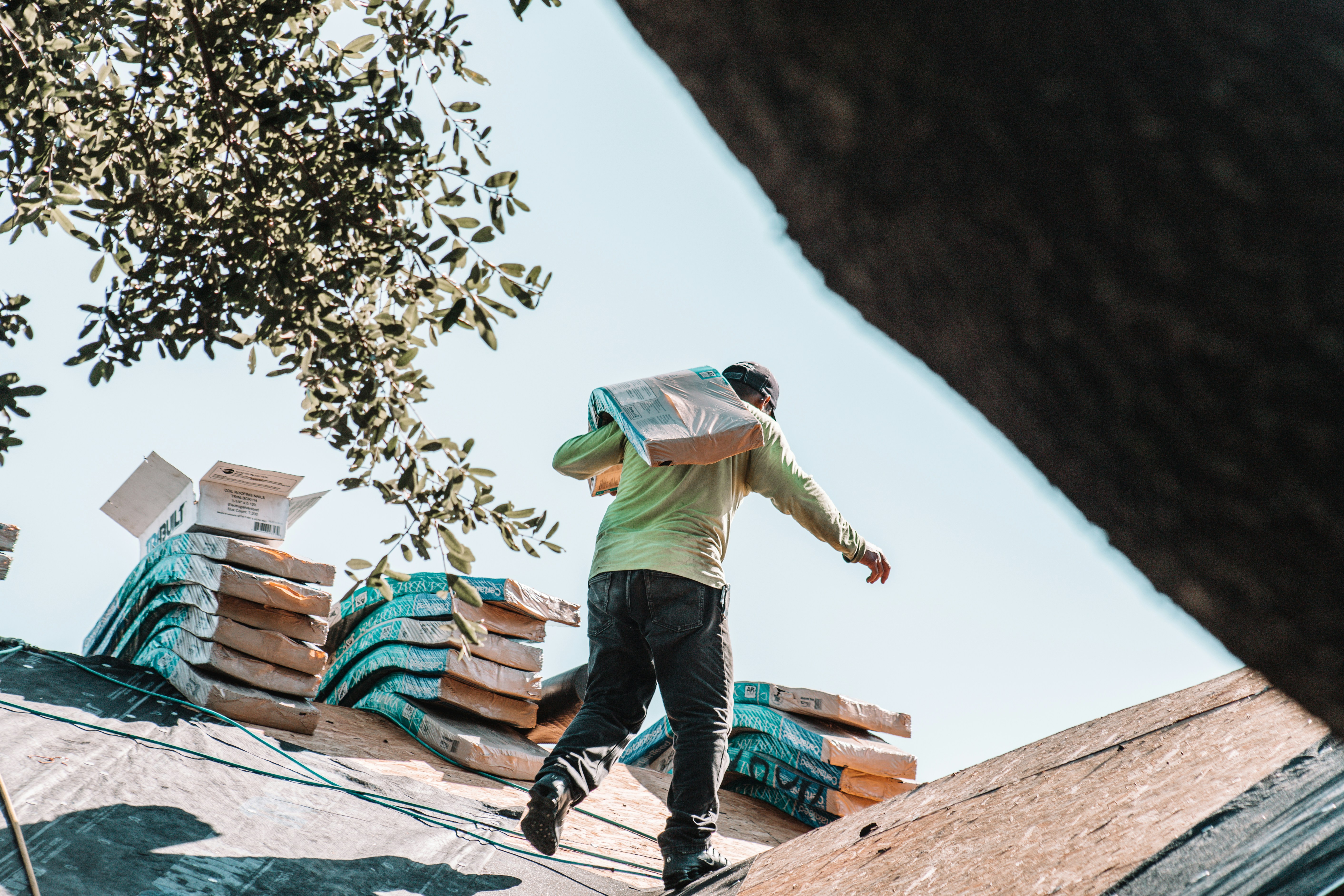Roofers working on a residential roof